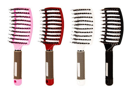 CJDropshipping anti-knot hairbrush with ergonomic handle, designed for women to easily detangle and smooth hair.