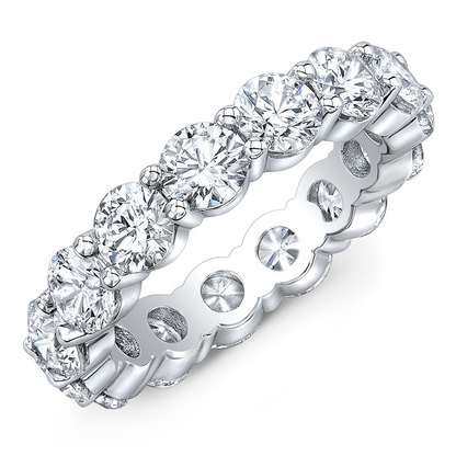14k gold overlay eternity band with 4.00 ct round cut created moissanite gemstones in a classic eternity ring style.
