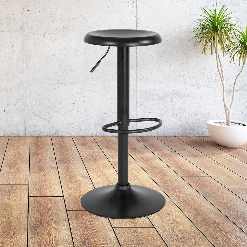 Adjustable height retro black barstool with metal legs and footrest, modern furniture piece by Start2Finish.