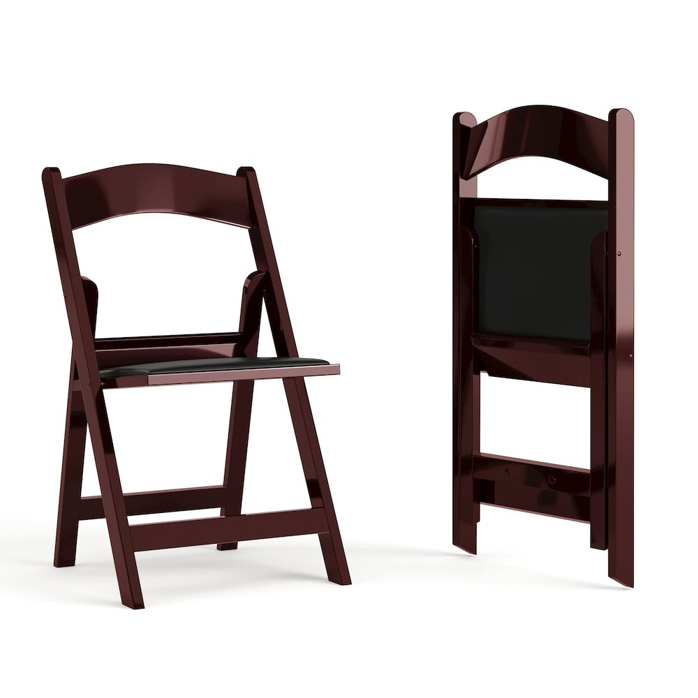Two red mahogany resin folding chairs with black padded vinyl seats from the HERCULES Series, 1000 lb. capacity, by Start2Finish.