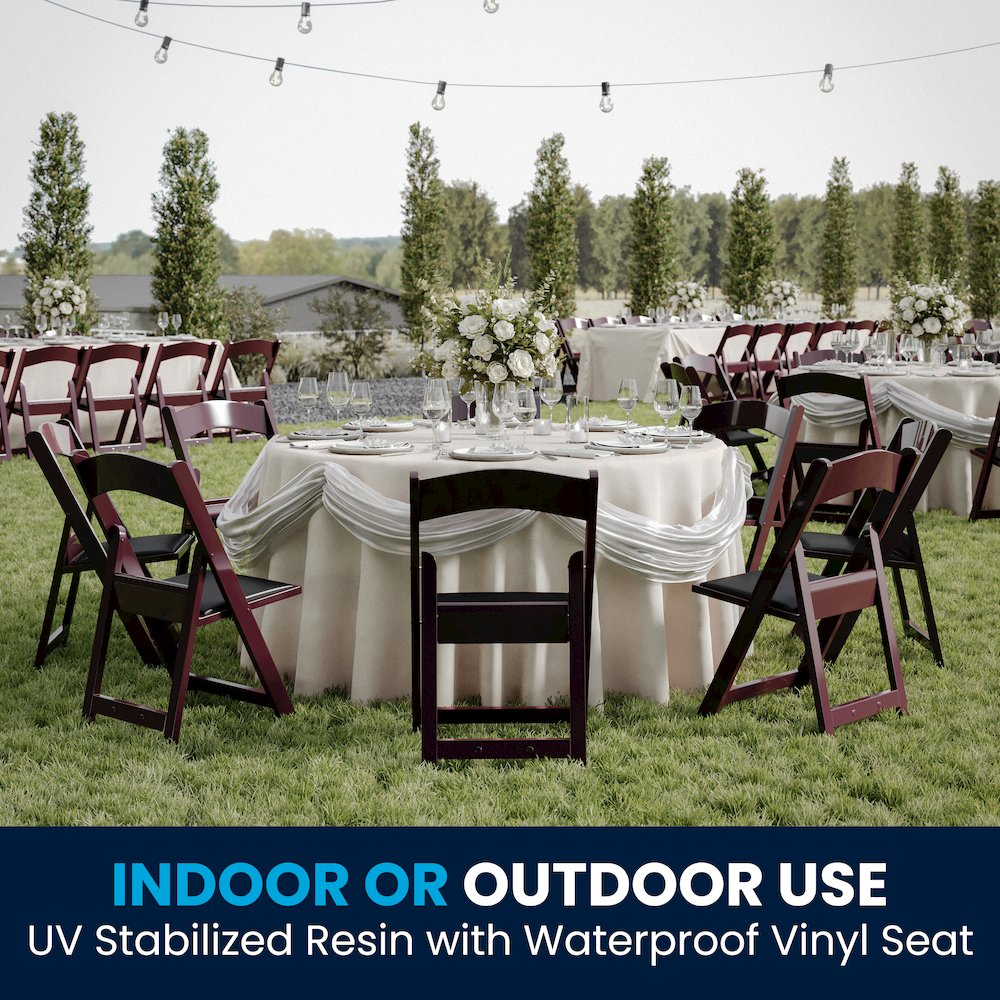 Two red mahogany resin folding chairs by HERCULES with black vinyl padded seats, 1000 lb. capacity, ideal for outdoor or event furniture