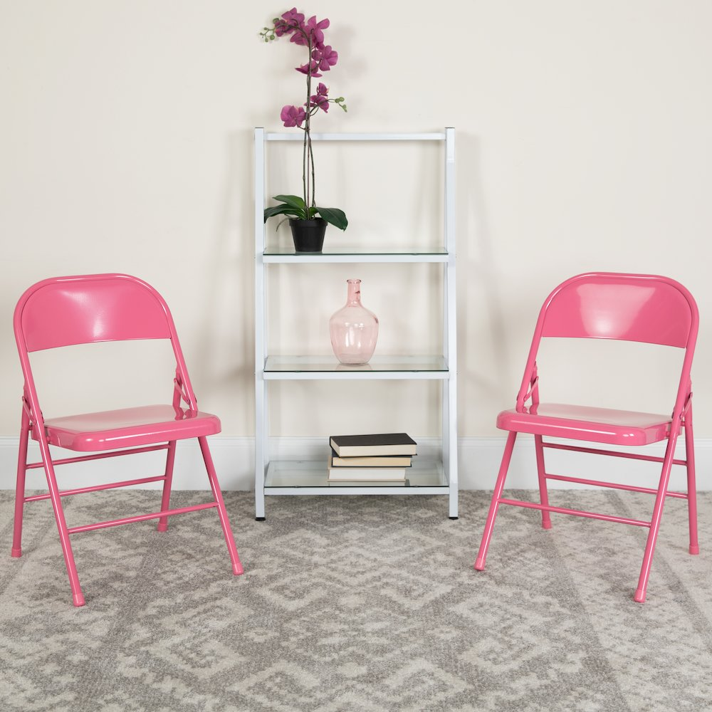 Start2Finish bubblegum pink metal folding chair with triple braces and double hinges, showing its sturdy frame and vibrant color.