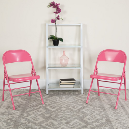 Start2Finish bubblegum pink metal folding chair with triple braces and double hinges, showing its sturdy frame and vibrant color.