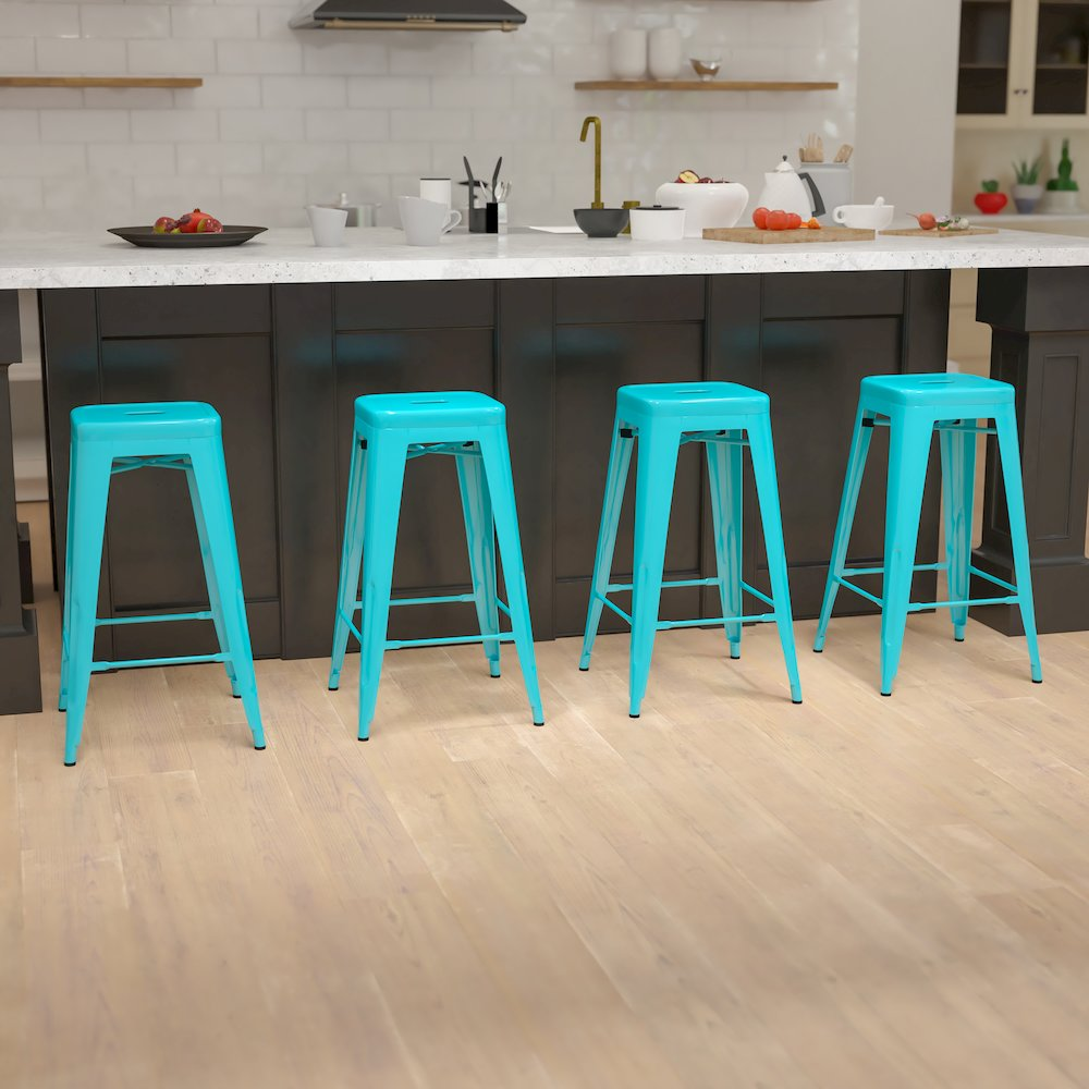 Set of four 30-inch teal metal indoor bar stools by Start2Finish, stackable with modern design for kitchen or bar use.