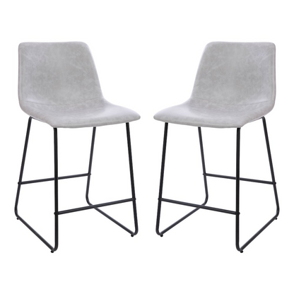 Set of 2 Light Gray LeatherSoft counter height barstools with wooden legs and backrests, designed for kitchen or bar area.