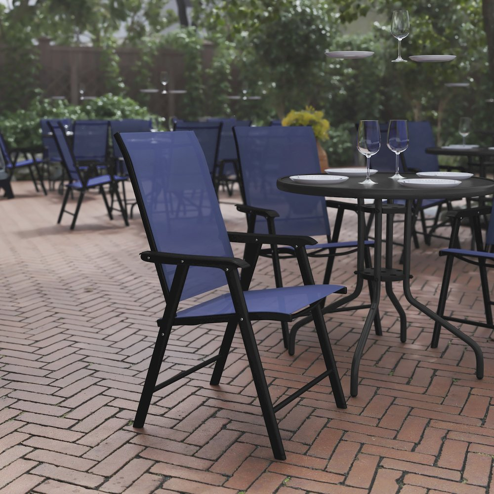 Set of 2 modern Start2Finish patio folding chairs with metal frames and fabric seats, shown outdoors on a patio.