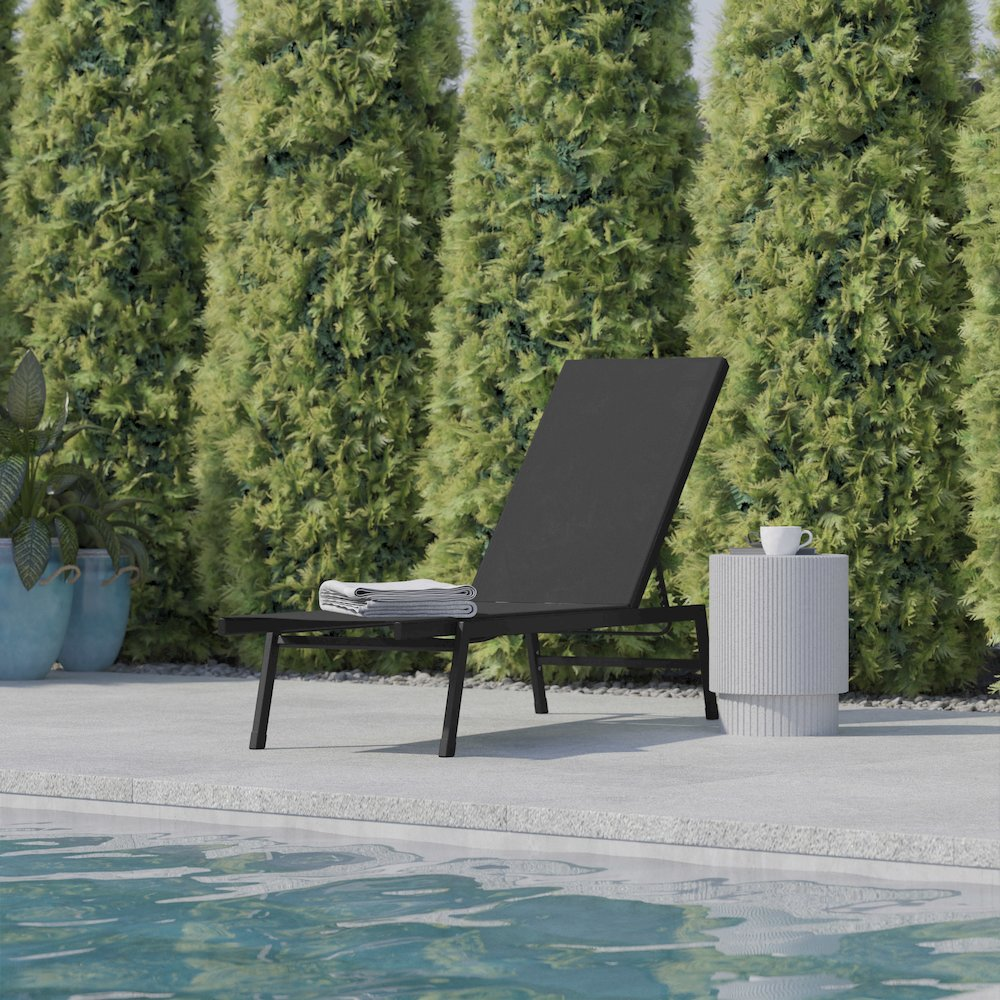 Modern outdoor chaise lounge chair by Start2Finish with cushioned seat and backrest, suitable for patio or poolside relaxation.