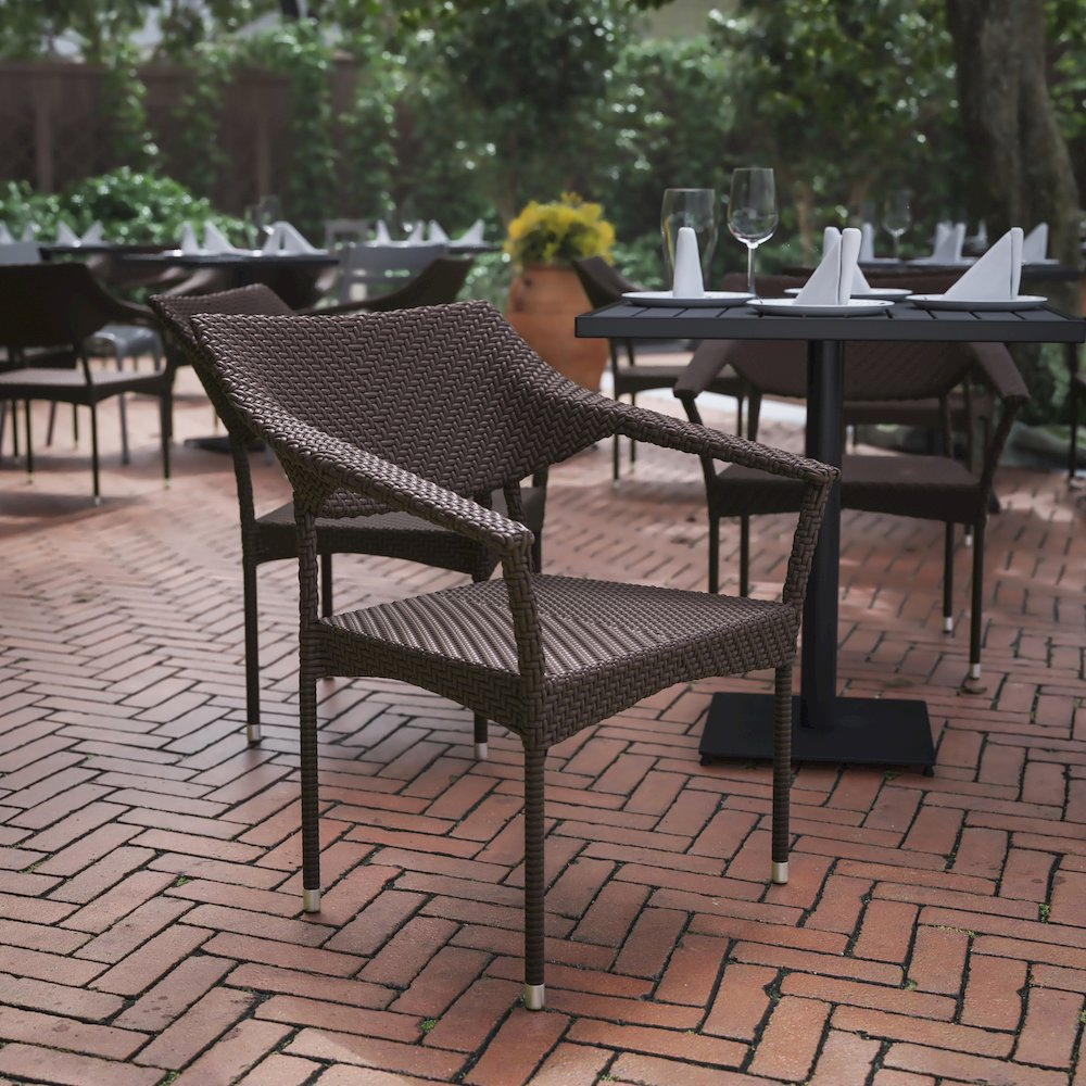 Modern stackable patio dining chair with arms by Start2Finish, featuring a sleek design and comfortable armrests for outdoor seating.