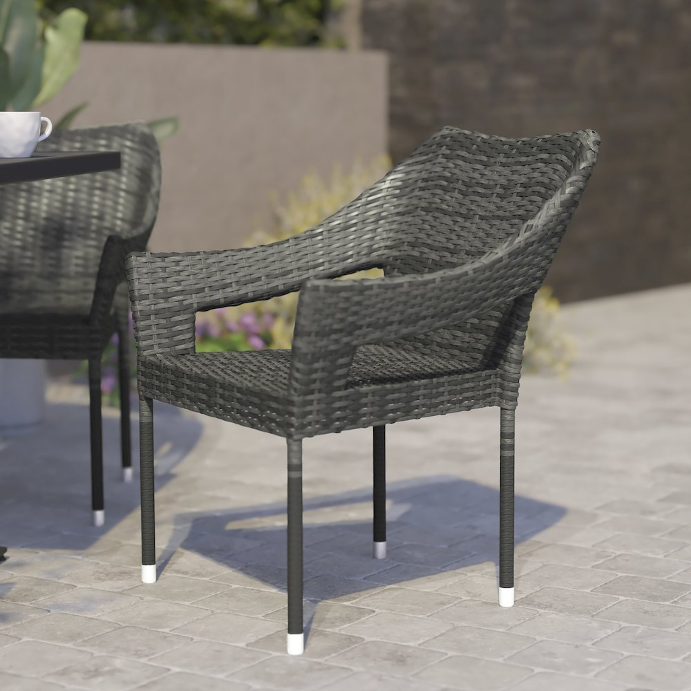 Modern stackable patio dining chair with arms by Start2Finish, featuring a sleek design and comfortable armrests for outdoor dining.