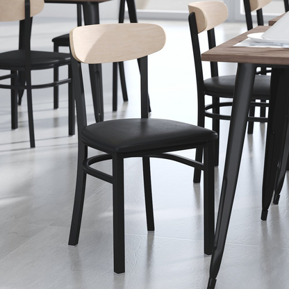 Commercial dining chair with vinyl upholstered seat and wood boomerang back, featuring a sturdy wooden frame by Start2Finish.