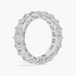 Created Moissanite eternity band ring with 5.00 CTW emerald cut stones in 14k white gold overlay, showcasing sparkling gemstones.