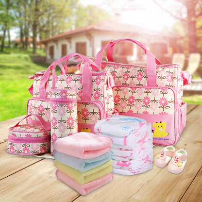 Set of five Pear Daisy baby diaper bags with shoulder straps, ideal for moms to carry baby essentials in stylish home and garden settings.
