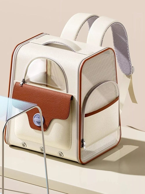 Portable breathable pet carrier backpack by Pear Daisy, designed for comfortable pet transport in home and outdoor settings.