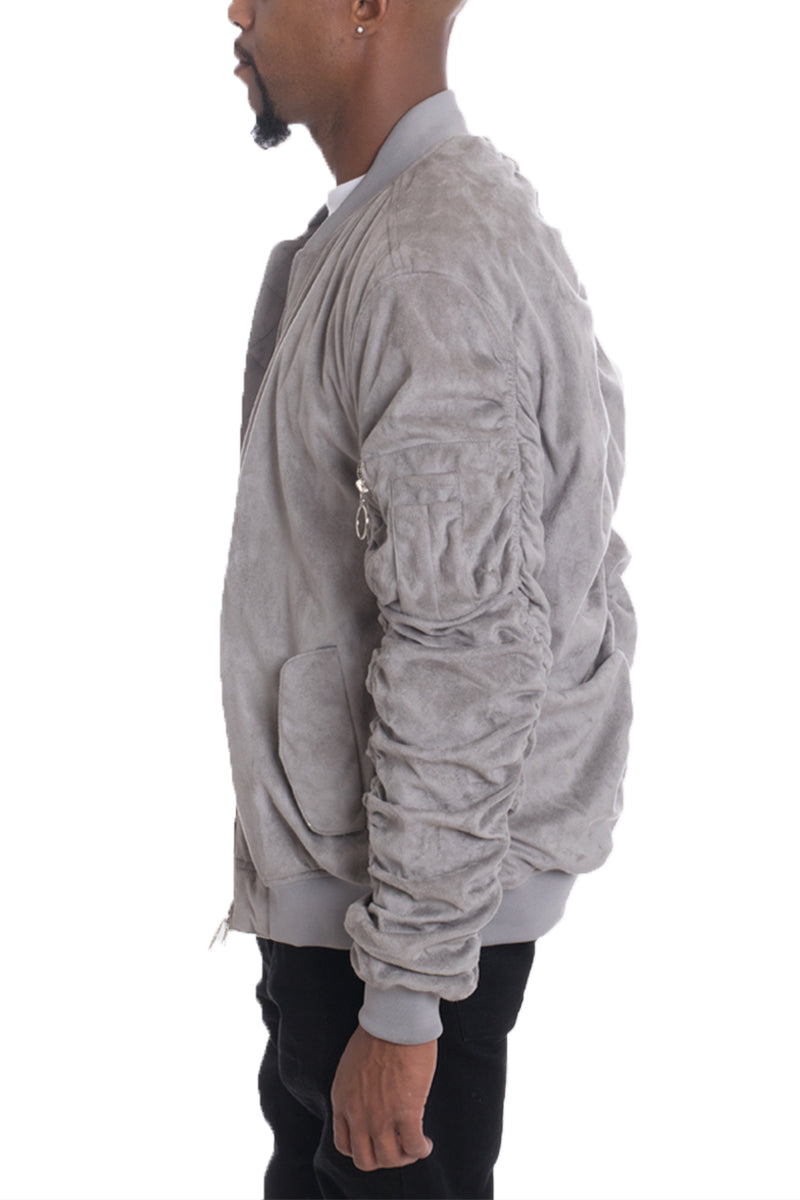 Grey Smoke faux suede Lime Milo bomber jacket with tagged details, shown on a hanger.