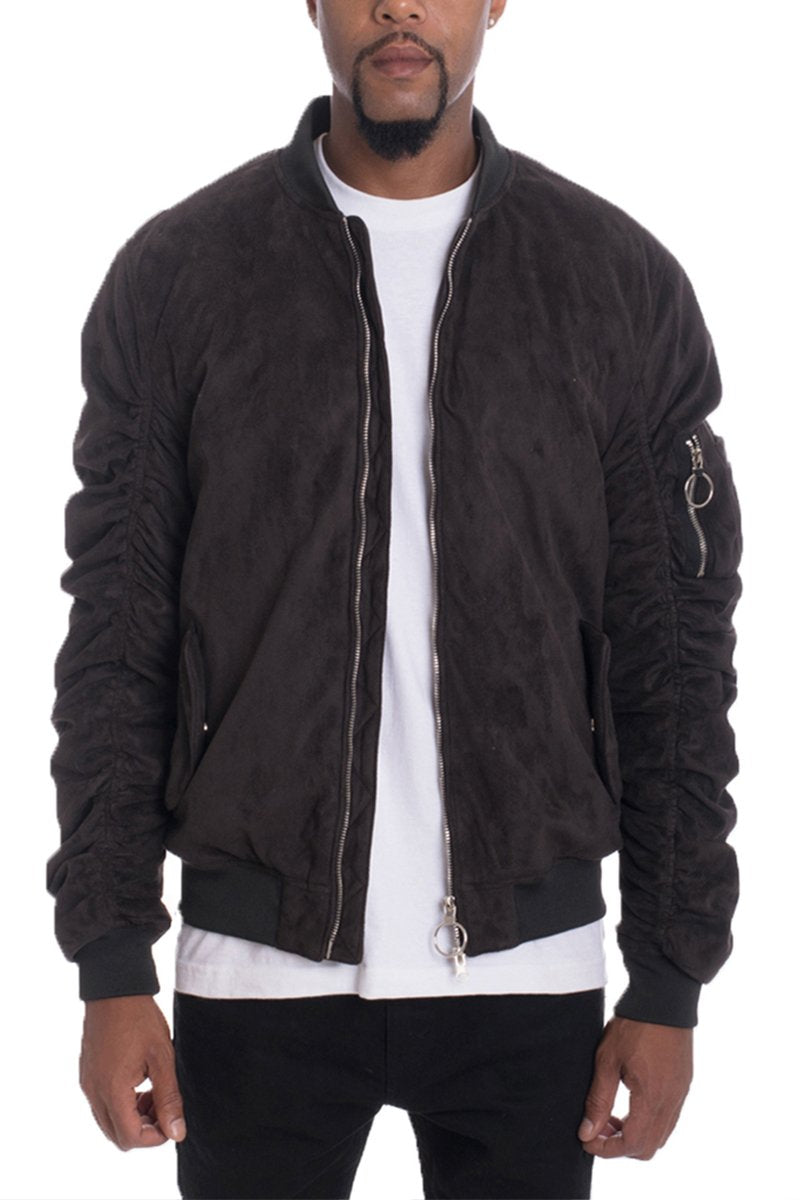 Black faux suede bomber jacket by Lime Milo, featuring a classic fit and sleek design, displayed on a hanger.