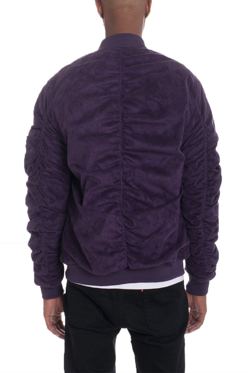 Lime Milo faux suede bomber jacket in plum color, stylish activewear with a relaxed fit and zip front, on a hanger.