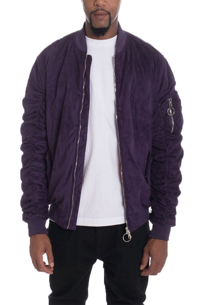 Lime Milo faux suede bomber jacket in plum color, stylish activewear with a fitted design, shown on a model.