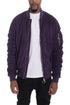 Lime Milo faux suede bomber jacket in plum color, stylish activewear with a fitted design, shown on a model.