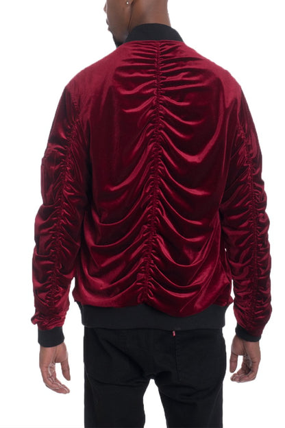 Lime Milo velour cinch sleeve bomber jacket with ribbed collar and cuffs, shown on a hanger, in a close-up view.