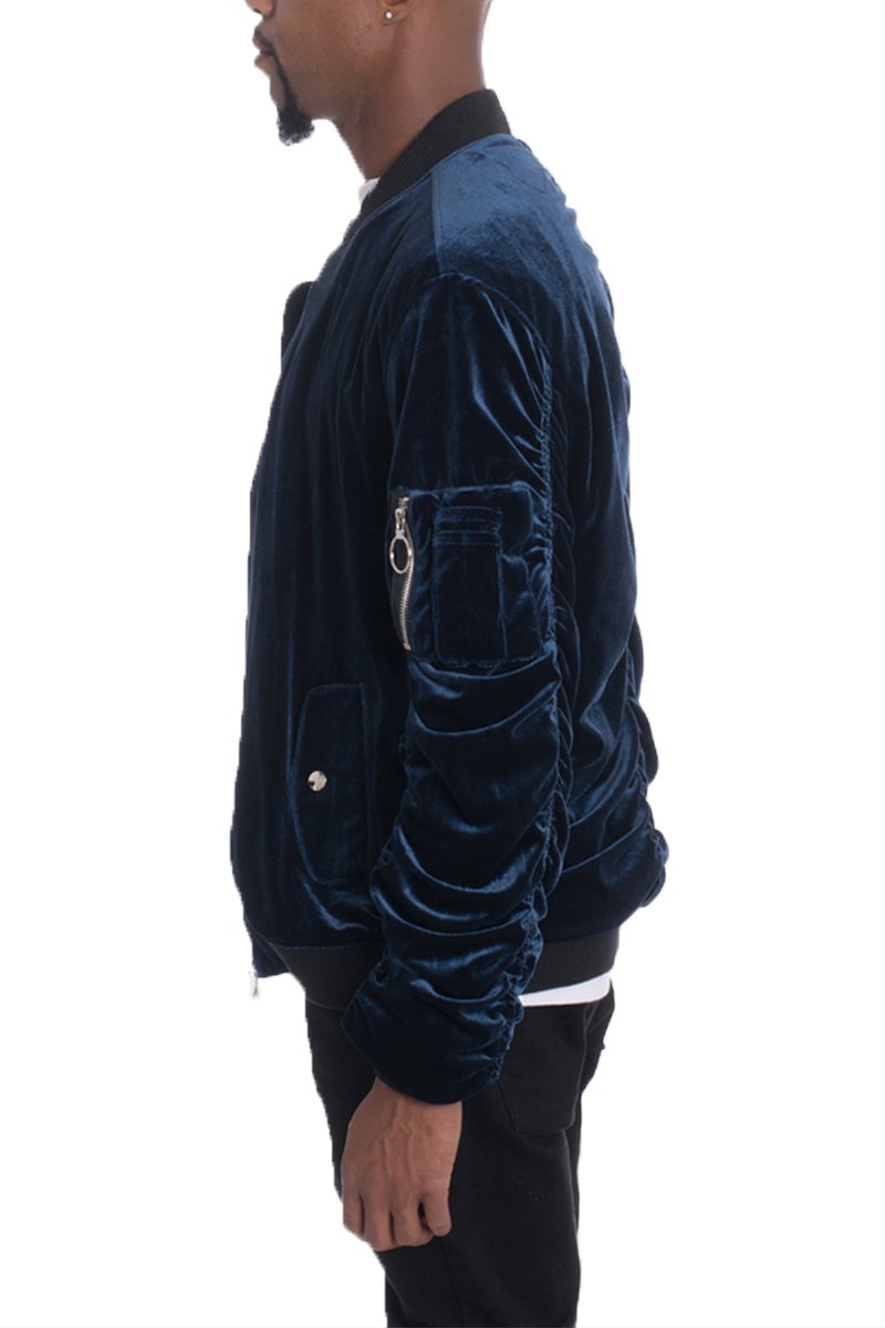 Velour lime Milo bomber jacket with cinch sleeves, front zipper, and ribbed collar, displayed on a neutral background.