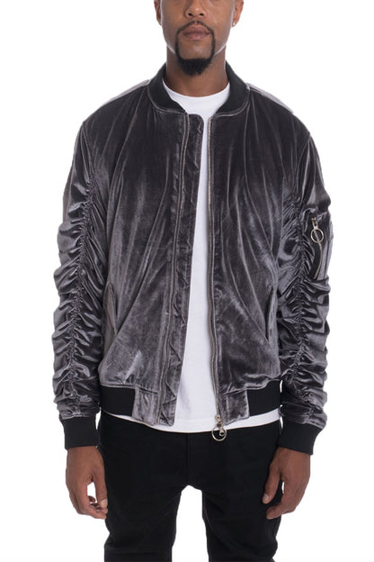 Silver velour cinch sleeve bomber jacket by Lime Milo, featuring a relaxed fit and stylish cinched sleeves, displayed on a hanger.