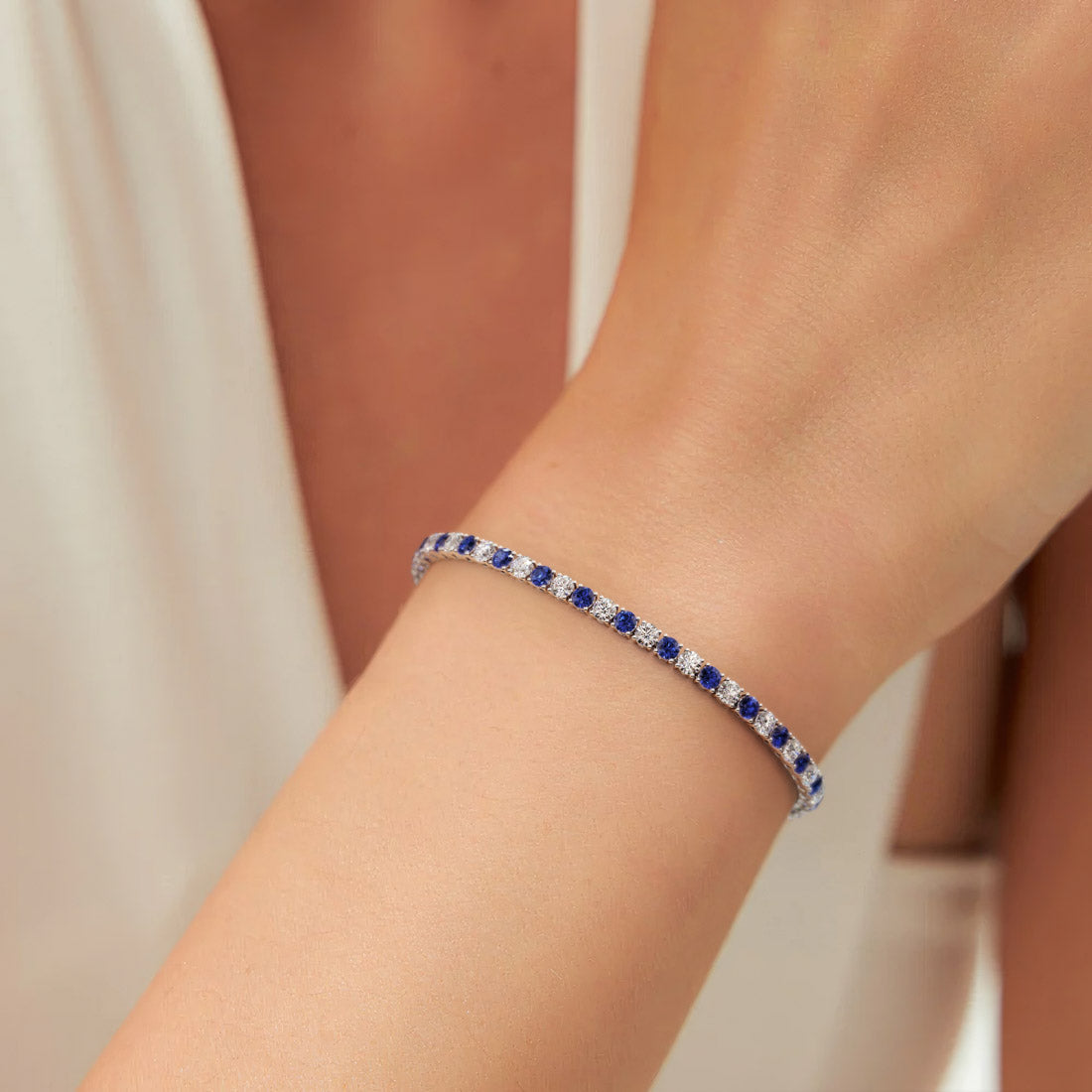 Start2Finish 7.50 CTW lab-created blue sapphire and diamond tennis bracelet in 14K white gold overlay, featuring sparkling gemstones.