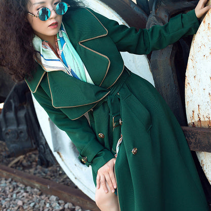 British style long double-breasted coat by Carmine Juneberry, featuring classic tailoring and a warm, tailored fit.