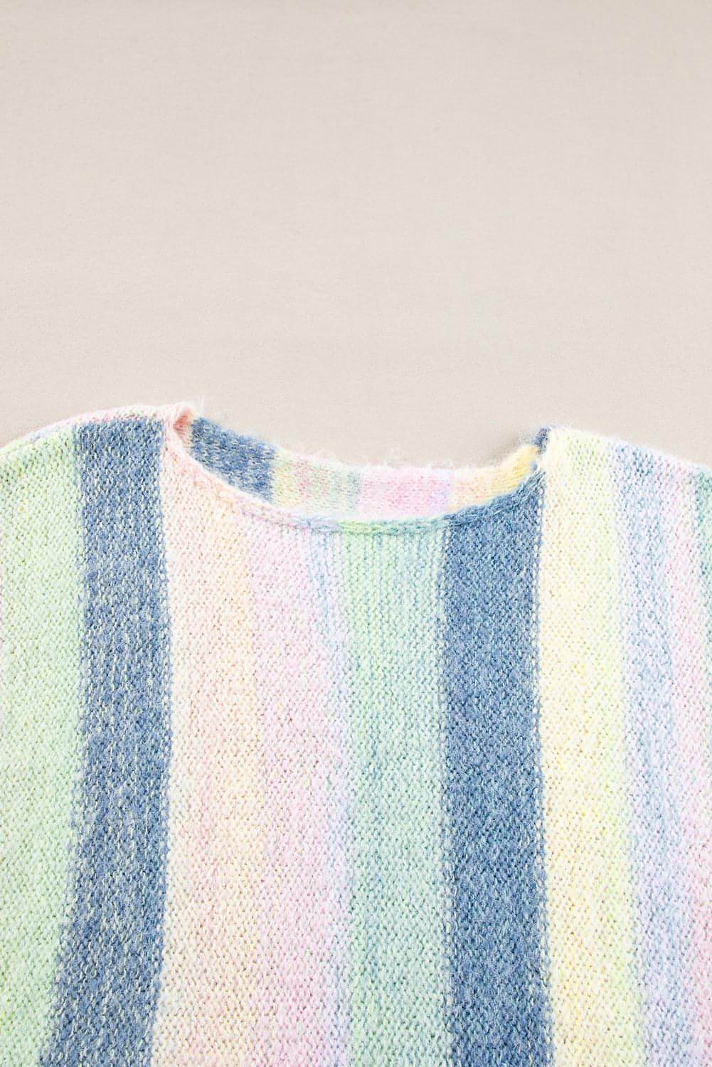 Purple color block fringed drop shoulder sweater by Carmine Juneberry, featuring a cozy tunic style with fringed details.