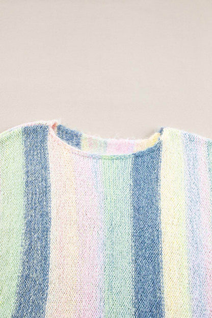 Purple color block fringed drop shoulder sweater by Carmine Juneberry, featuring a cozy tunic style with fringed details.