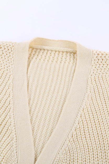 Beige wrap V-neck sweater with side tie from Harlequin Daisy, ideal for bath and beauty comfort and casual wear.