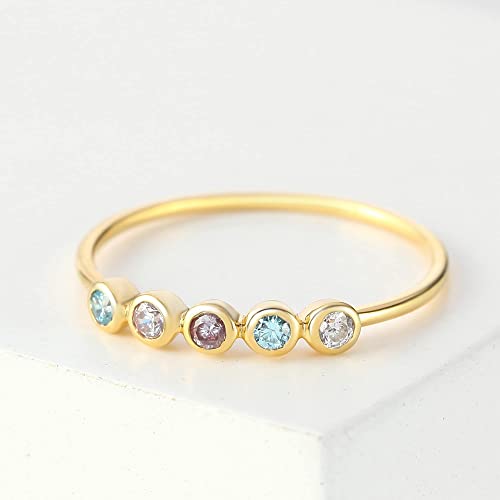 Green Millie birthstone ring featuring multiple colorful gemstones representing children’s birthstones in a silver band.