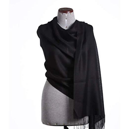 Black alpaca and silk shawl by Aegerine, showcasing soft, luxurious blend of 70% baby alpaca and 30% silk in a versatile scarf style.