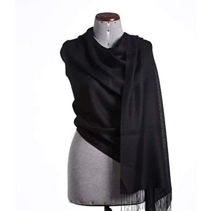 Black alpaca and silk shawl by Aegerine, showcasing soft, luxurious blend of 70% baby alpaca and 30% silk in a versatile scarf style.