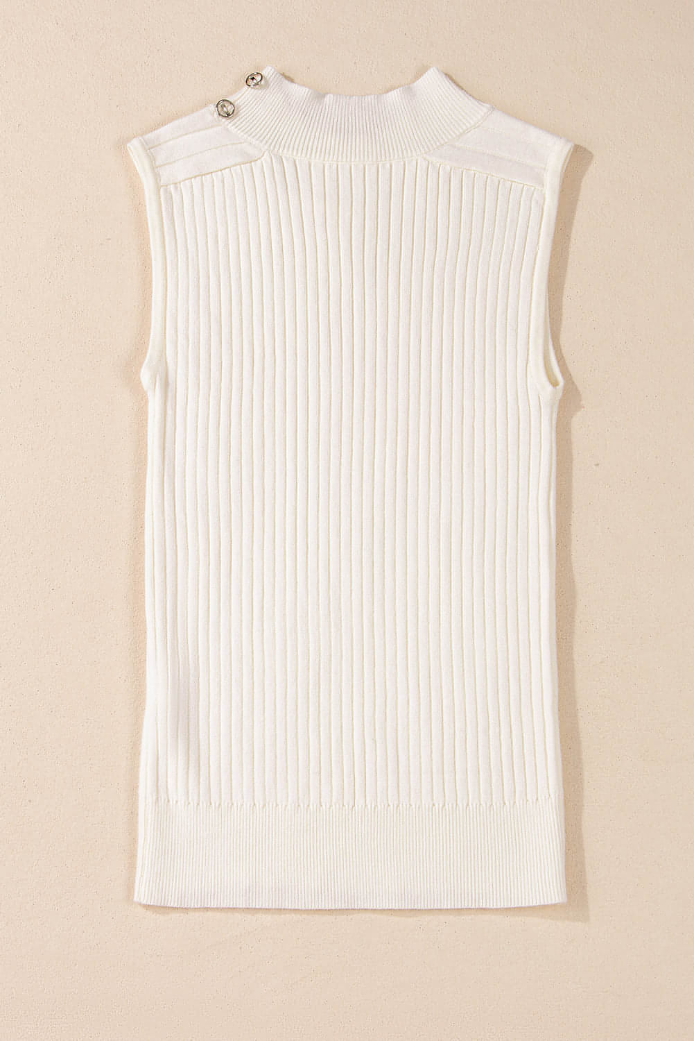 White ribbed knit high neck sweater vest by Carmine Juneberry, featuring a cozy, fitted design perfect for layered tops.