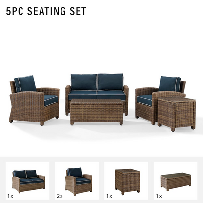 Start2Finish 5-piece outdoor loveseat furniture set with two armchairs, side table, and coffee table in a garden setting.