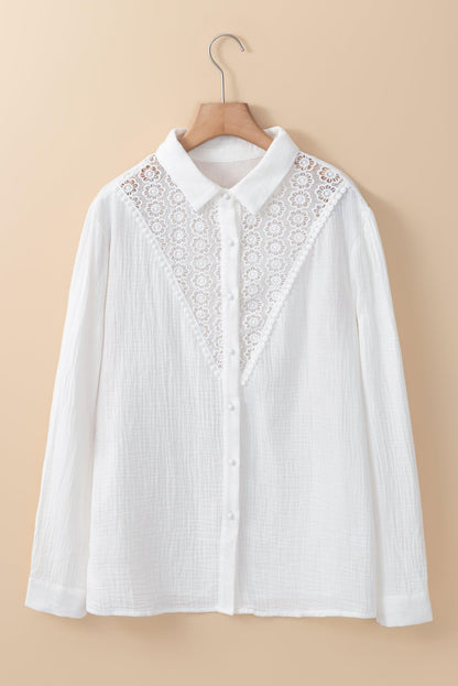 White floral lace hollow-out splicing crinkled blouse by Carmine Juneberry, featuring intricate lace and stylish splicing details.