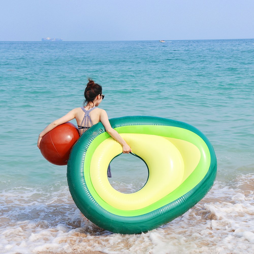 Maroon Asteria inflatable giant avocado pool float with green and brown design, perfect for swimming and lounging in the pool