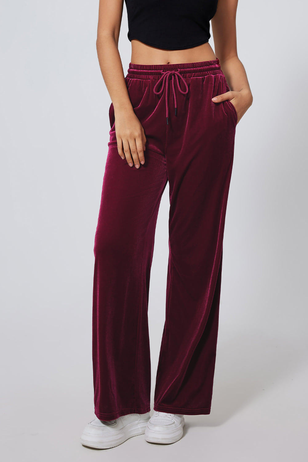 Burgundy solid drawstring waist wide-leg pants by Carmine Juneberry, featuring a relaxed fit and comfortable fabric.