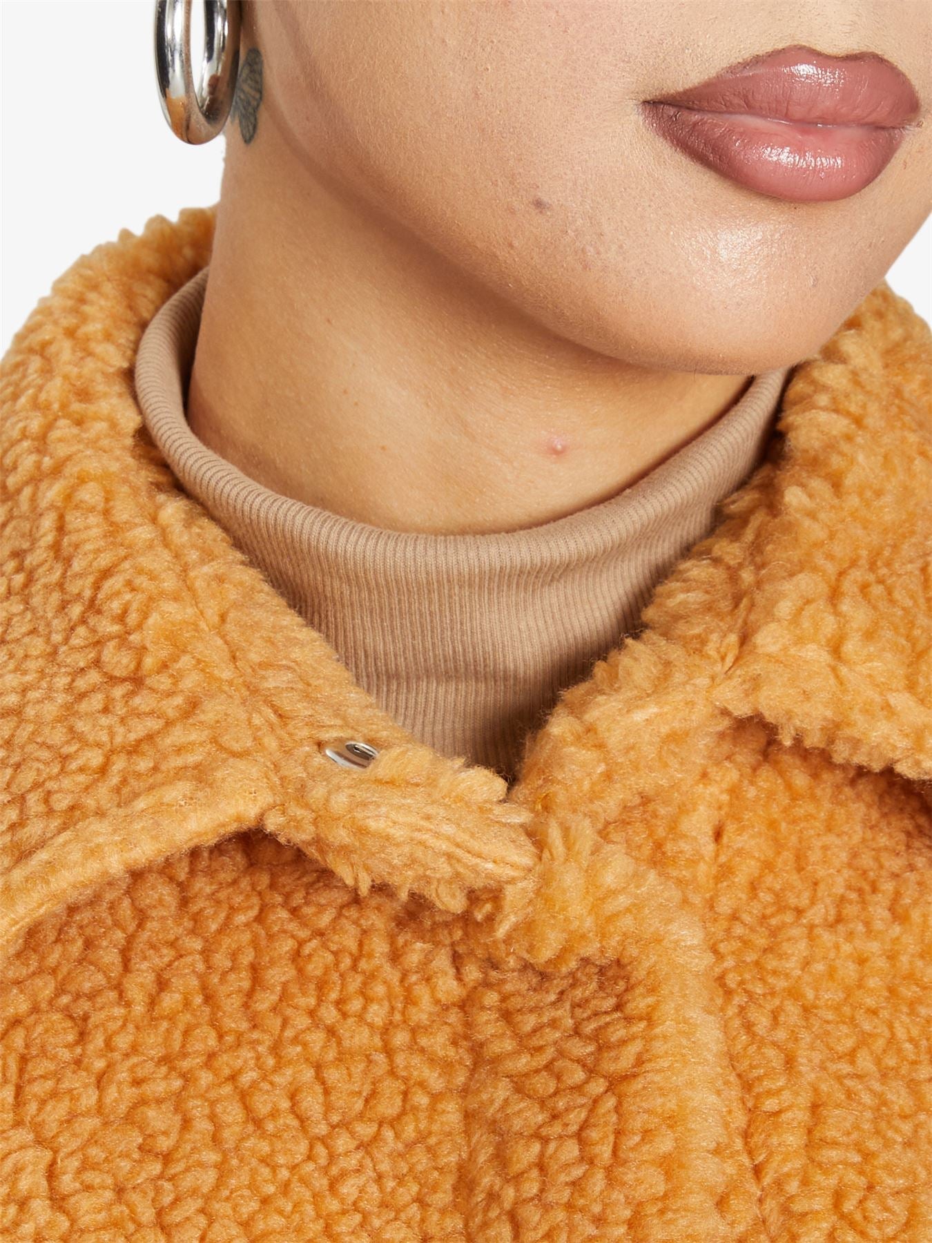 Oversized Rose Eleusis Patch Pocket Borg Teddy Shacket with cozy textured fabric and large front pockets.