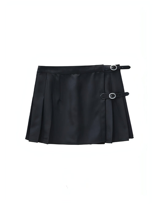 Carmine Juneberry pleated skirt in soft fabric with a flowy silhouette, shown hanging on a hanger against a neutral background.