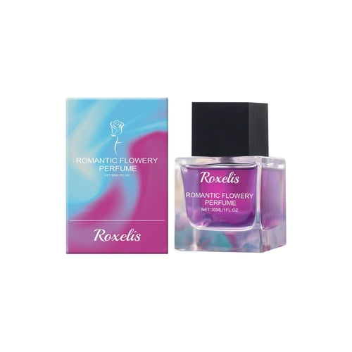 Elegant Carmine Juneberry Romantic Light Perfume bottle for bodycare, showcasing its sleek design and delicate floral accents.