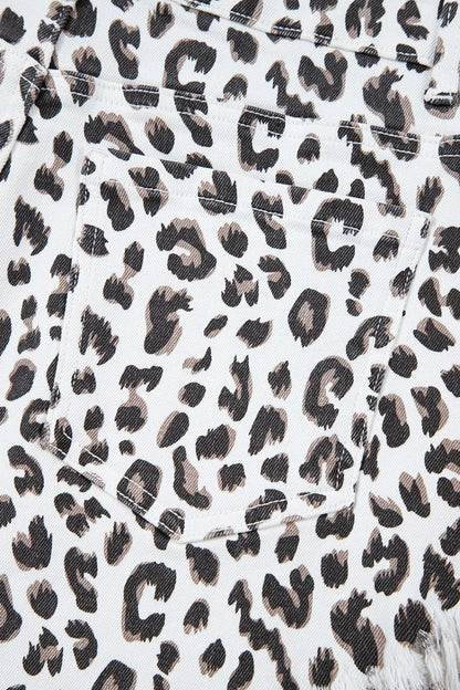 Leopard print frayed hem denim shorts for women by Ruby Styx, showing the stylish distressed hem and animal print pattern.