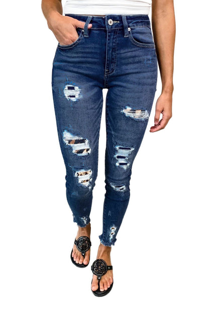 Dark blue leopard patch distressed skinny jeans for women by Jade, featuring a trendy slim fit and stylish distressed detailing.