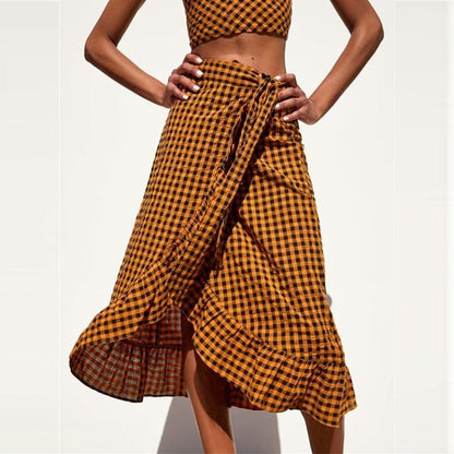Yellow plaid ruffle midi skirt for women with high waist and bow detail, by Jade, showcasing a stylish and elegant design.