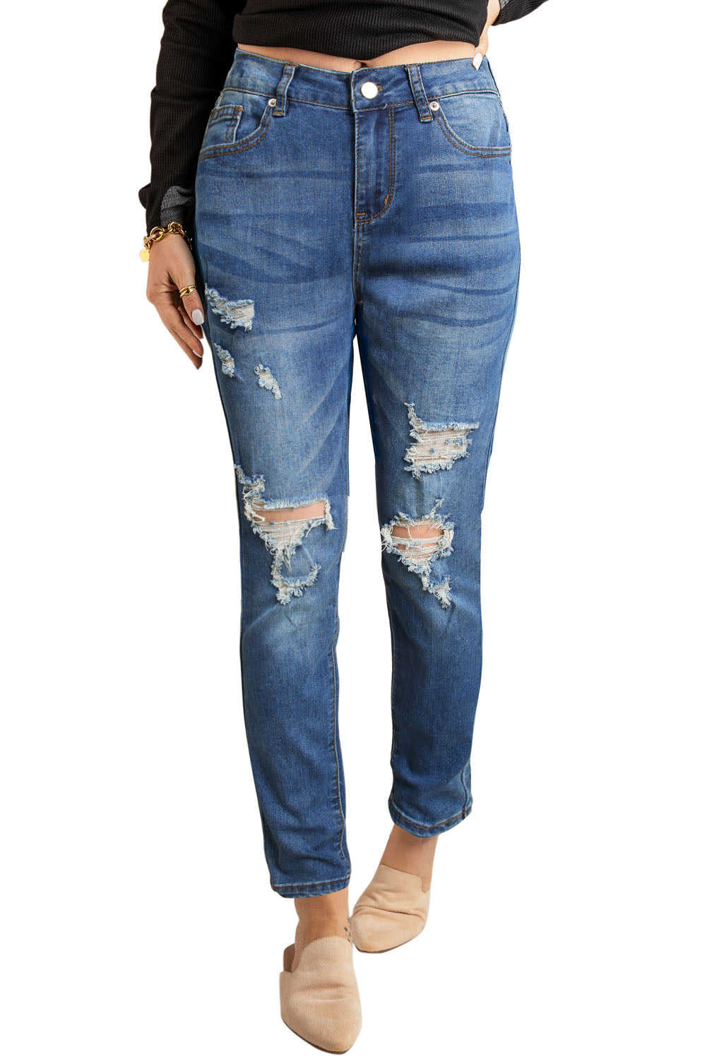 Blue hollow-out vintage skinny ripped jeans by Harlequin Daisy, featuring distressed details and a slim fit style.