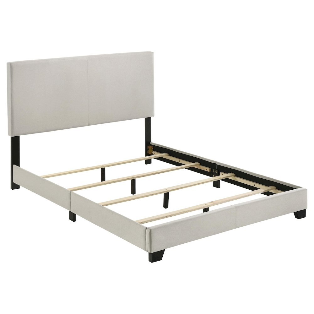 Cream fabric upholstered Dorian full panel bed by Start2Finish, showcasing a modern headboard and sleek furniture design.