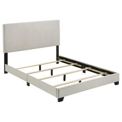 Cream fabric upholstered Dorian full panel bed by Start2Finish, showcasing a modern headboard and sleek furniture design.