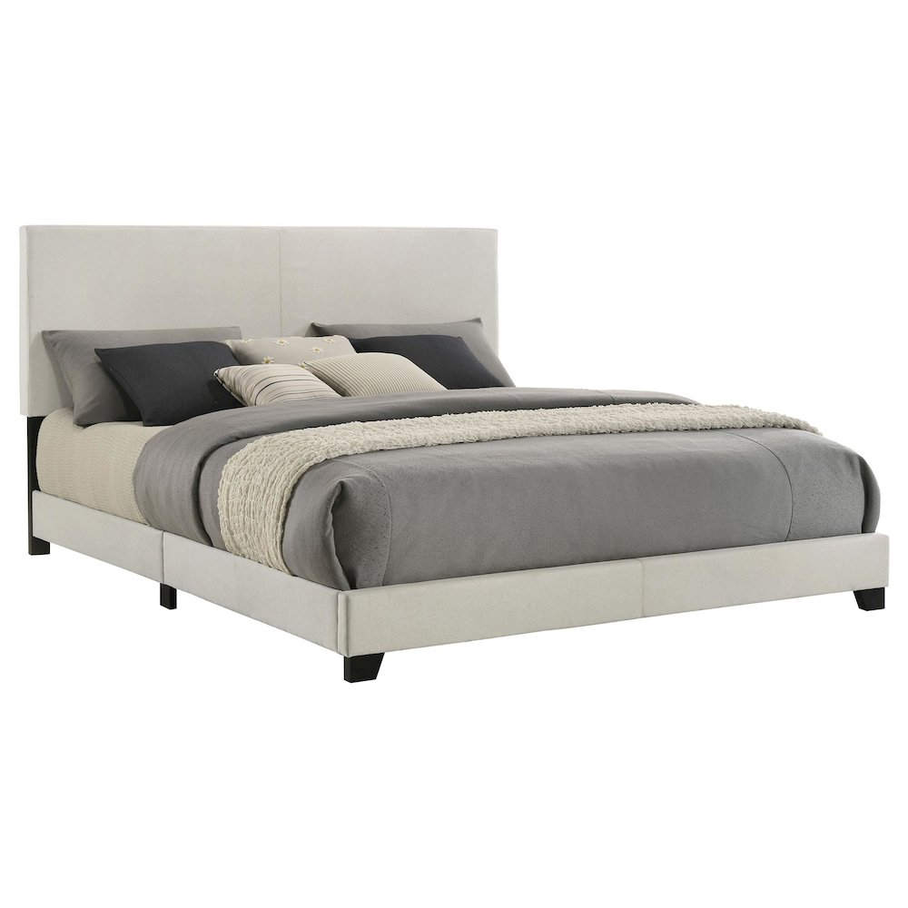 Eastern King panel bed with cream fabric upholstery and simple design, featuring a padded headboard and clean-lined frame.