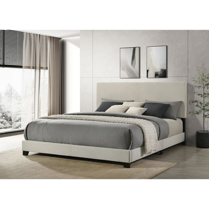 Cream fabric upholstered Eastern King panel bed by Start2Finish with a classic headboard and sleek, modern design.