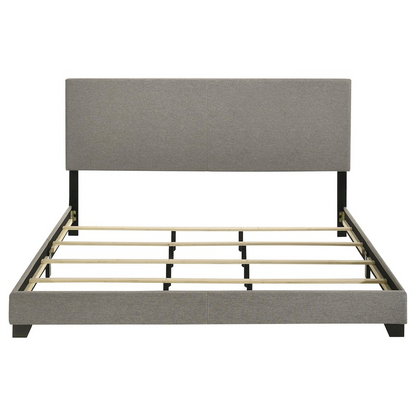 Eastern King Panel Bed by Start2Finish with taupe fabric upholstery, showcasing a stylish, upholstered bed frame with a paneled headboard.